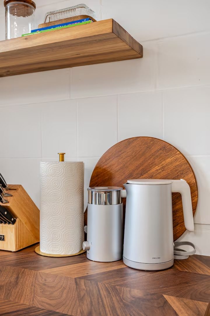 Kettle and coffee on the walnut counter